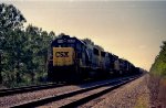 CSX 8618 waits with its train for a southbound to pass